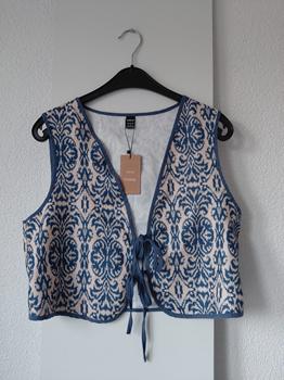 38 SHEIN giletje -HO